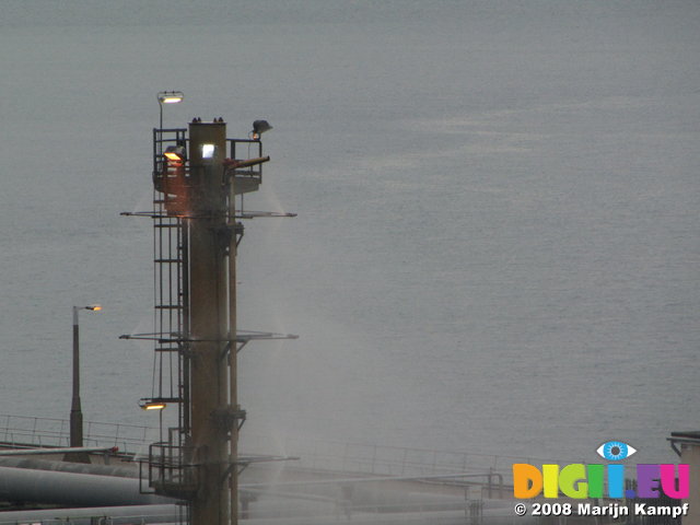 SX01182 Water spraying from oil tanker rig in Milford Haven